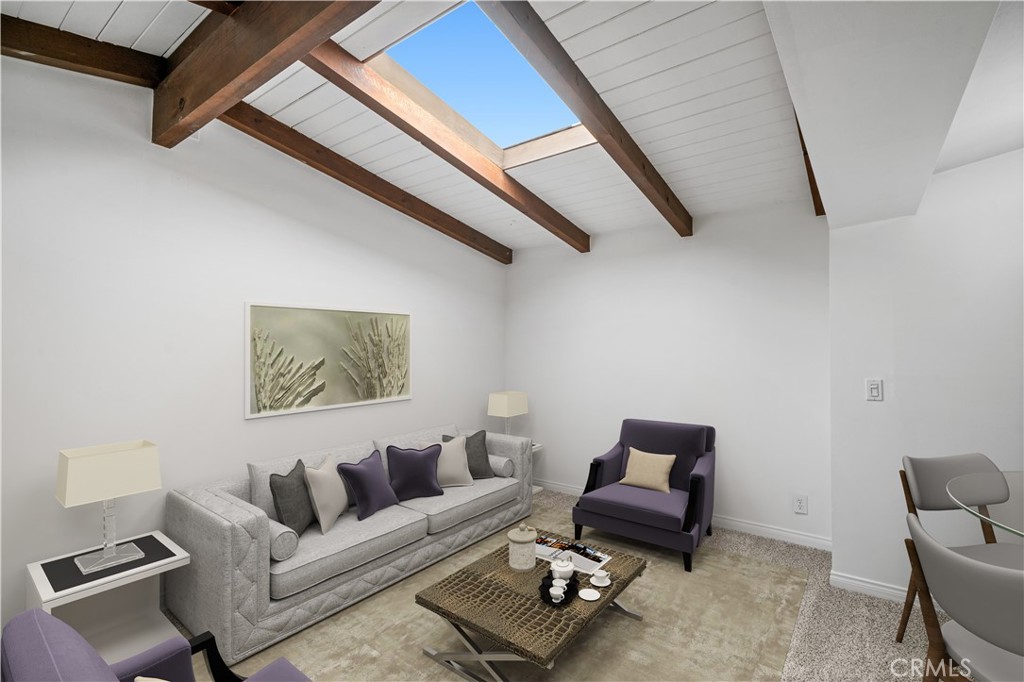 2115 Sterling Avenue Costa Mesa, CA 92627 - Photo 19 of 53 a living room with furniture and a rug