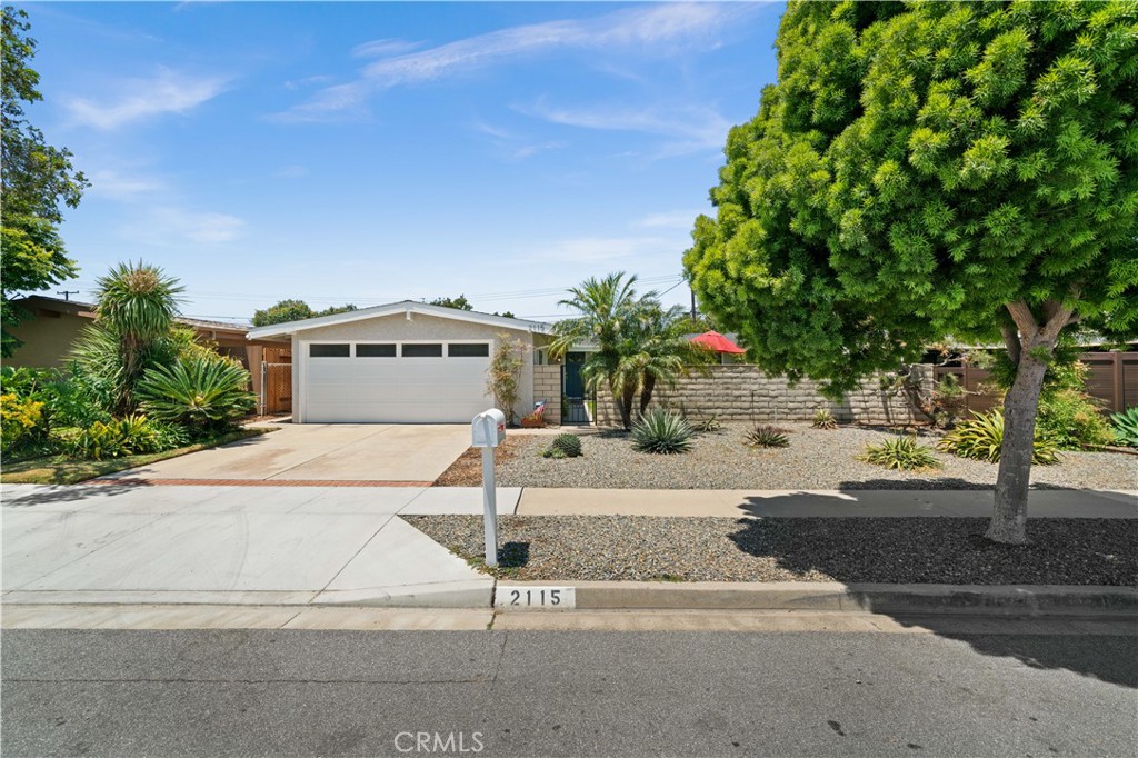 2115 Sterling Avenue Costa Mesa, CA 92627 - Photo 2 of 53 front view of a house with a street