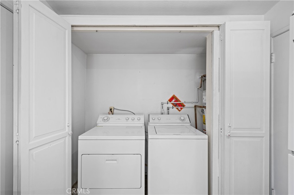 2115 Sterling Avenue Costa Mesa, CA 92627 - Photo 32 of 53 a utility room with dryer and washer