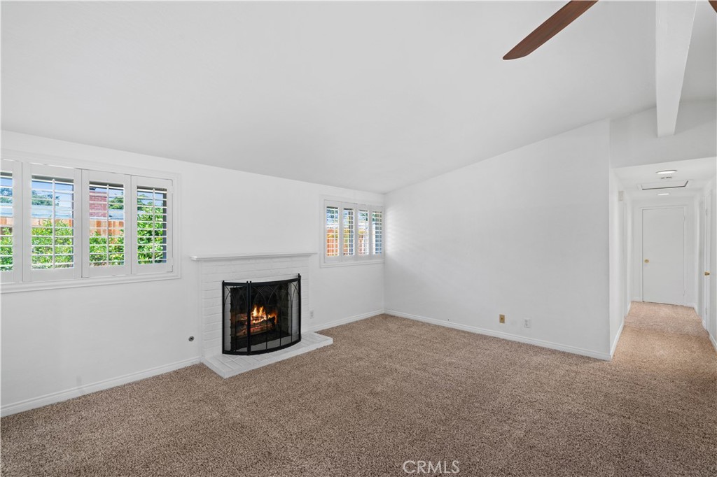2115 Sterling Avenue Costa Mesa, CA 92627 - Photo 35 of 53 a room with a fireplace