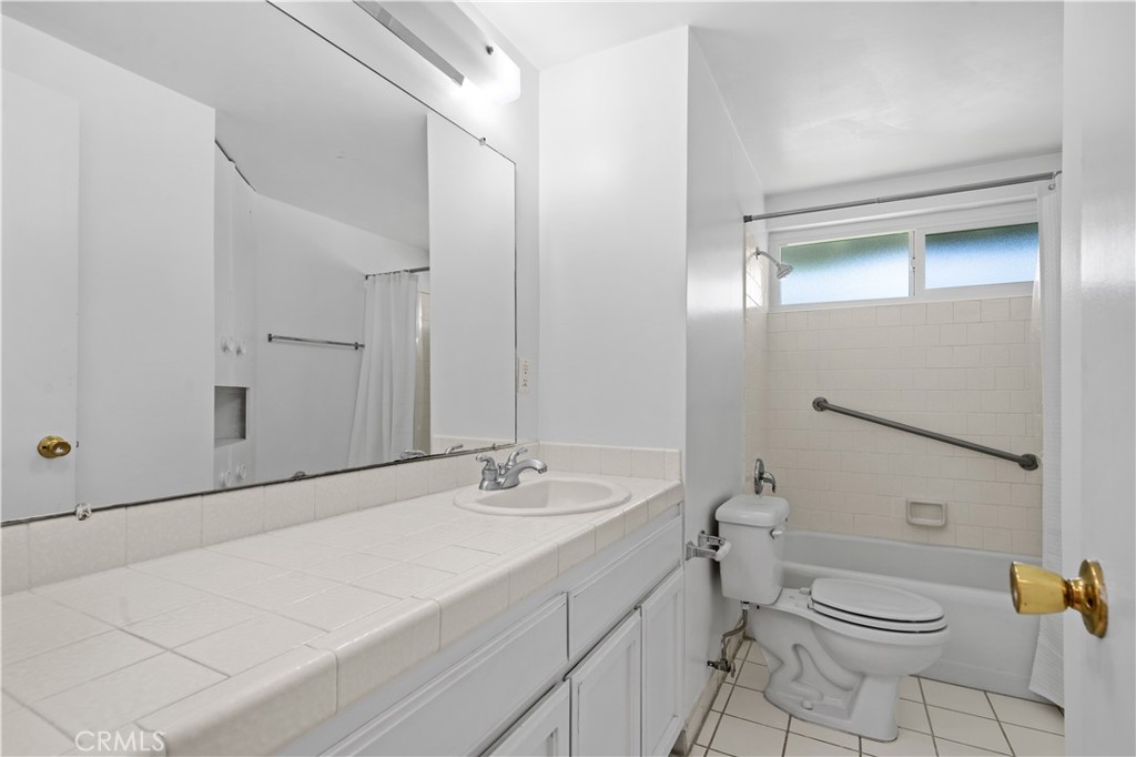 2115 Sterling Avenue Costa Mesa, CA 92627 - Photo 36 of 53 a bathroom with a sink toilet and shower