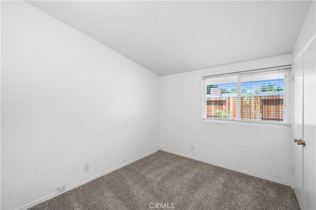 2115 Sterling Avenue Costa Mesa, CA 92627 - Photo 38 of 53 an empty room with a window
