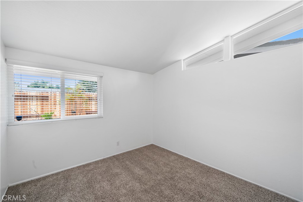 2115 Sterling Avenue Costa Mesa, CA 92627 - Photo 40 of 53 a view of an empty room with a window