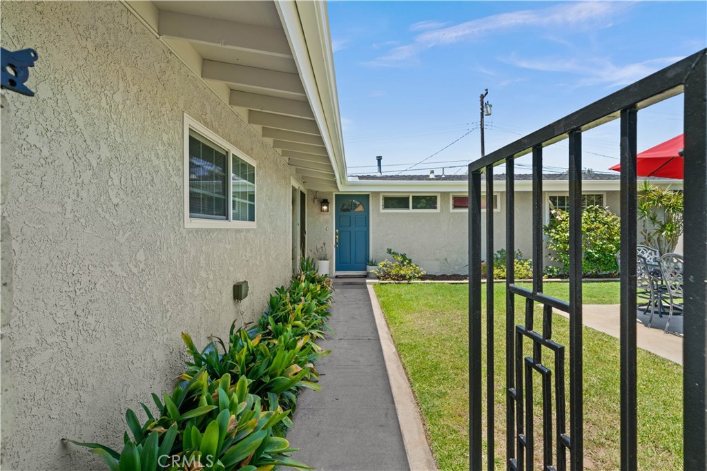 2115 Sterling Avenue Costa Mesa, CA 92627 - Photo 4 of 53 a porch with a table and chairs in balcony