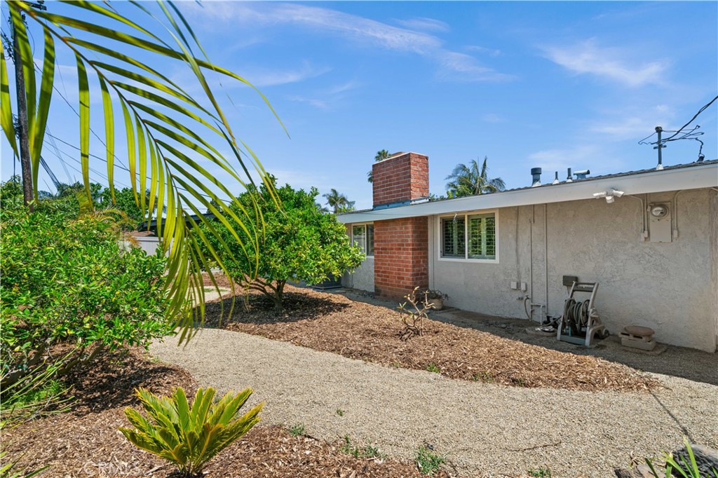 2115 Sterling Avenue Costa Mesa, CA 92627 - Photo 49 of 53 a front view of a house with a yard