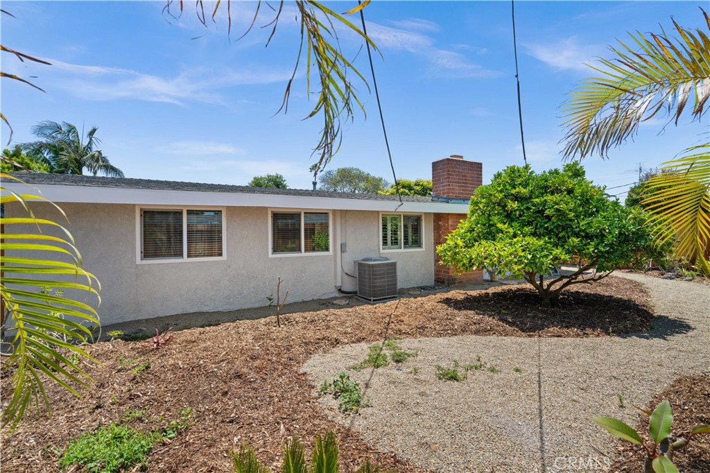 2115 Sterling Avenue Costa Mesa, CA 92627 - Photo 51 of 53 a front view of a house with garden