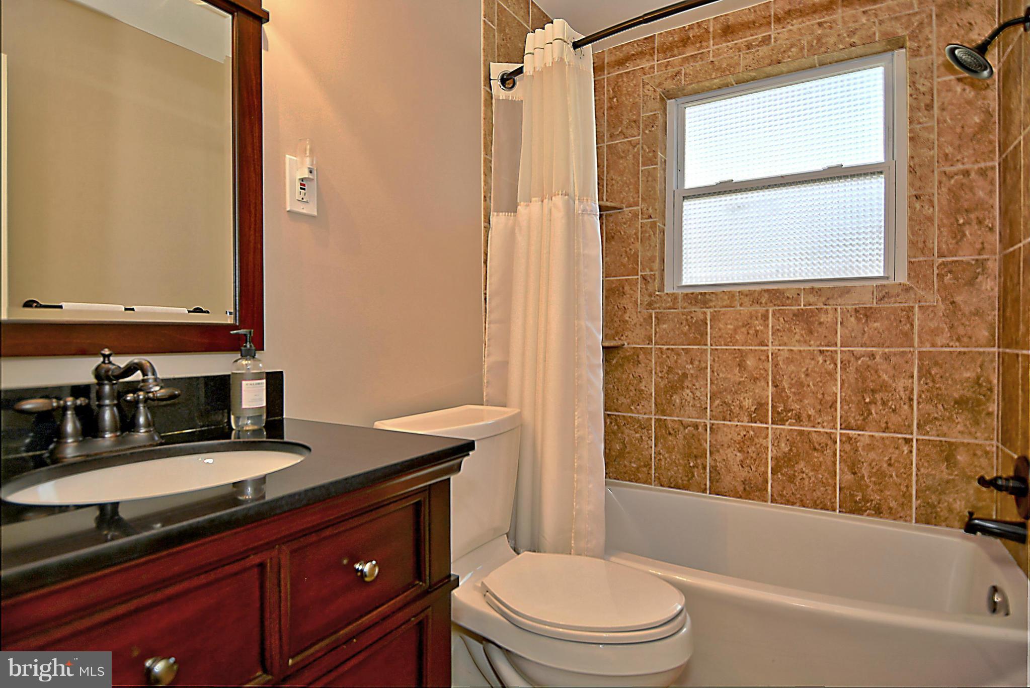 9609 Clarks Crossing Road Vienna, VA 22182 - Photo 14 of 28 Upper level hall bathroom