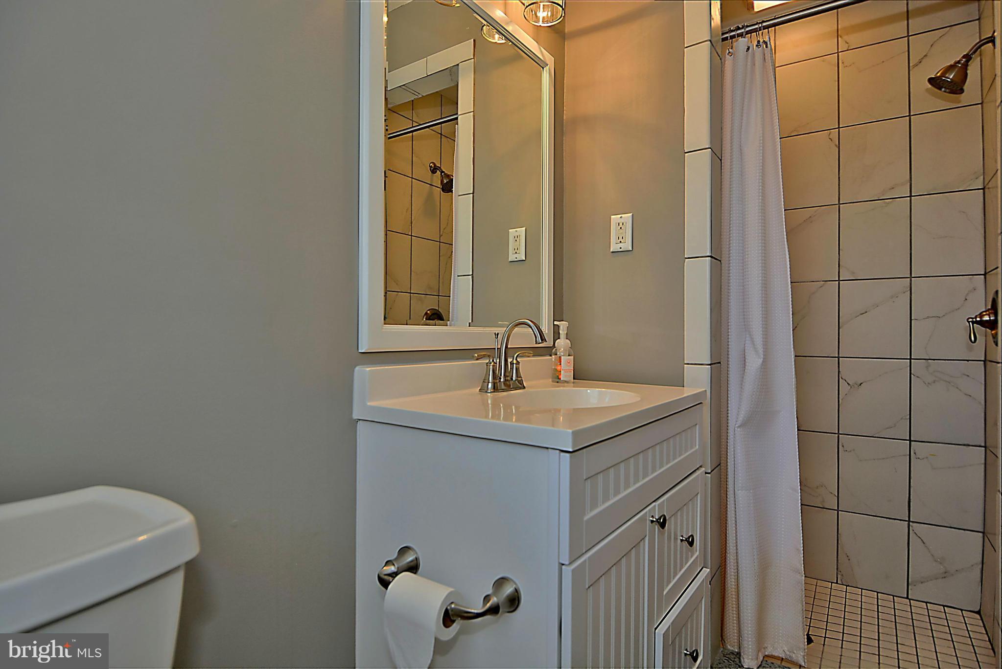 9609 Clarks Crossing Road Vienna, VA 22182 - Photo 17 of 28 Upper level bathroom
