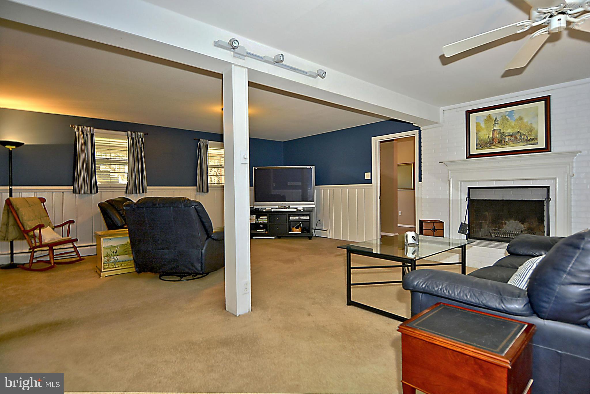 9609 Clarks Crossing Road Vienna, VA 22182 - Photo 20 of 28 Rec Room w/ wood-burning fireplace
