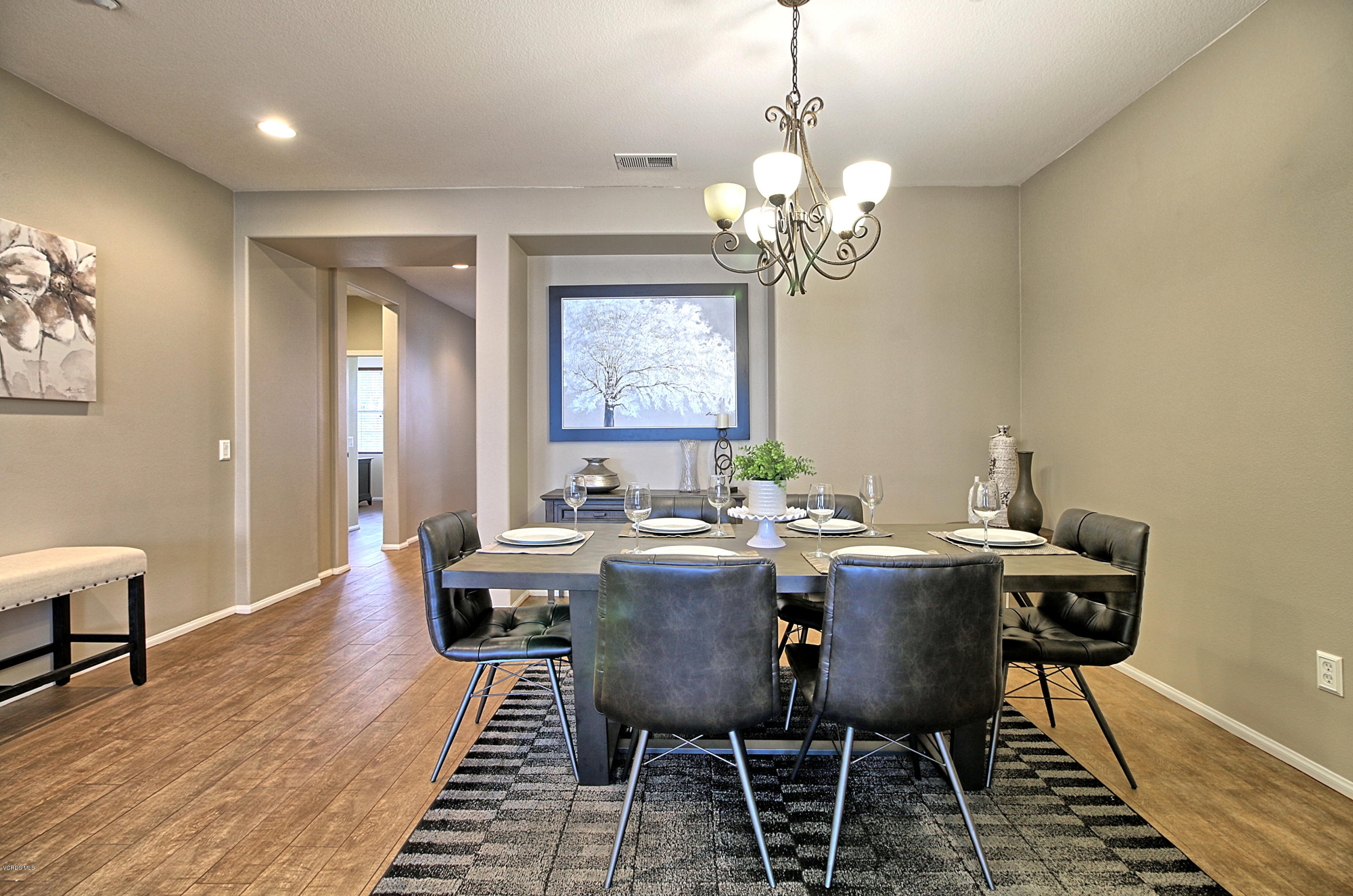 3305 Dunkirk Drive Oxnard, CA 93035 - Photo 4 of 20 a view of a dining room with furniture window and wooden floor