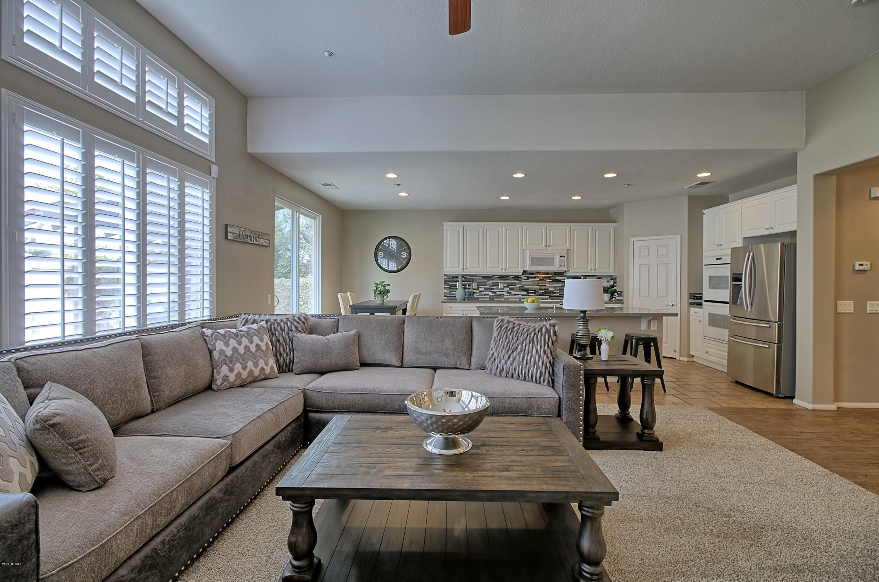 3305 Dunkirk Drive Oxnard, CA 93035 - Photo 6 of 20 a living room with stainless steel appliances a dining table and kitchen view