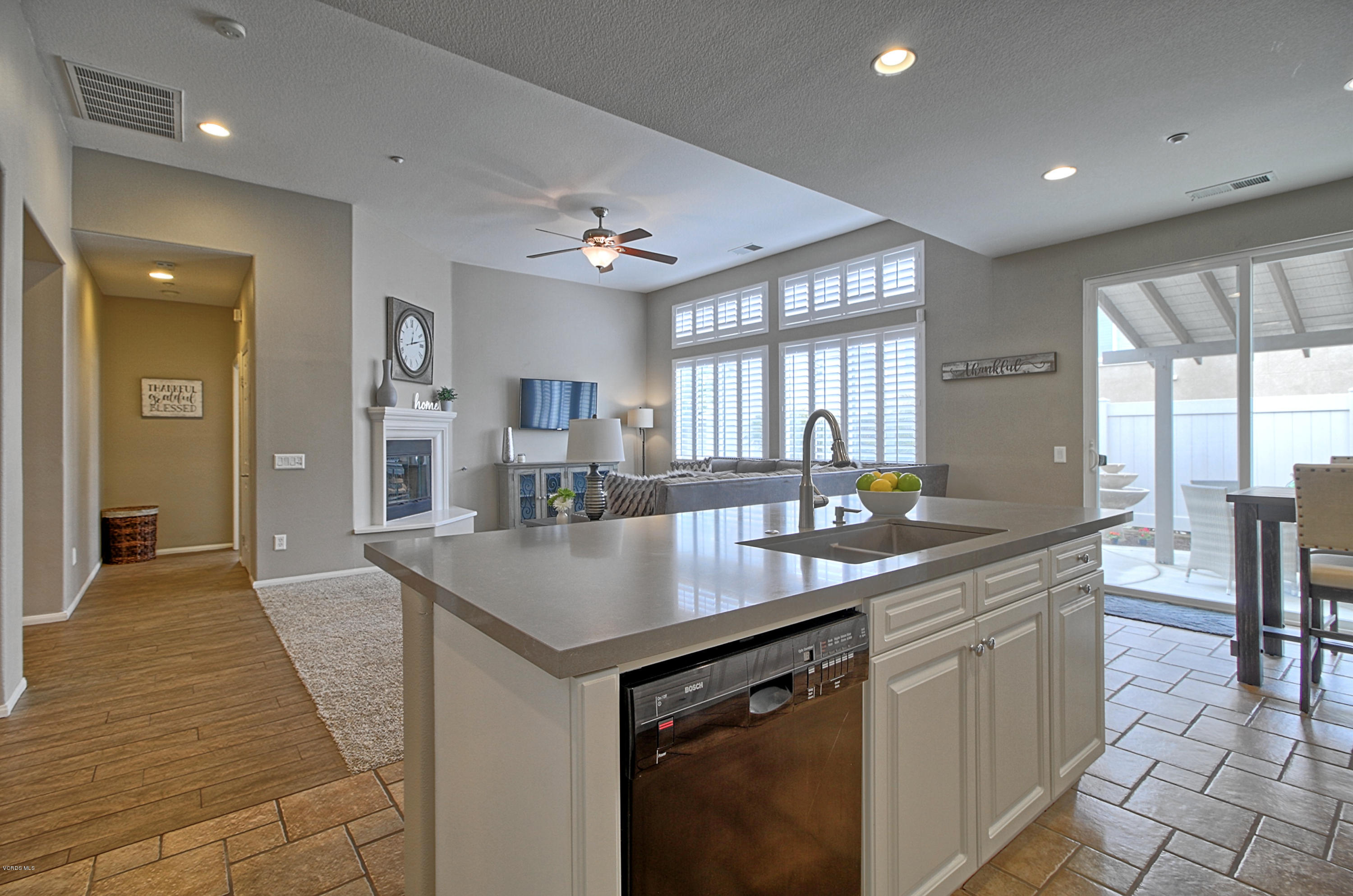 3305 Dunkirk Drive Oxnard, CA 93035 - Photo 10 of 20 a kitchen with counter top space sink and center island