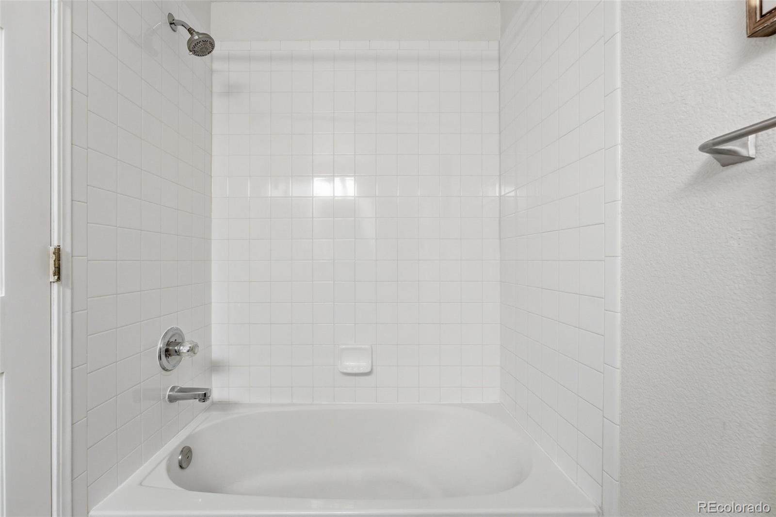 6471 St Vrain Ranch Boulevard Firestone, CO 80504 - Photo 21 of 45 a close up of a bathtub