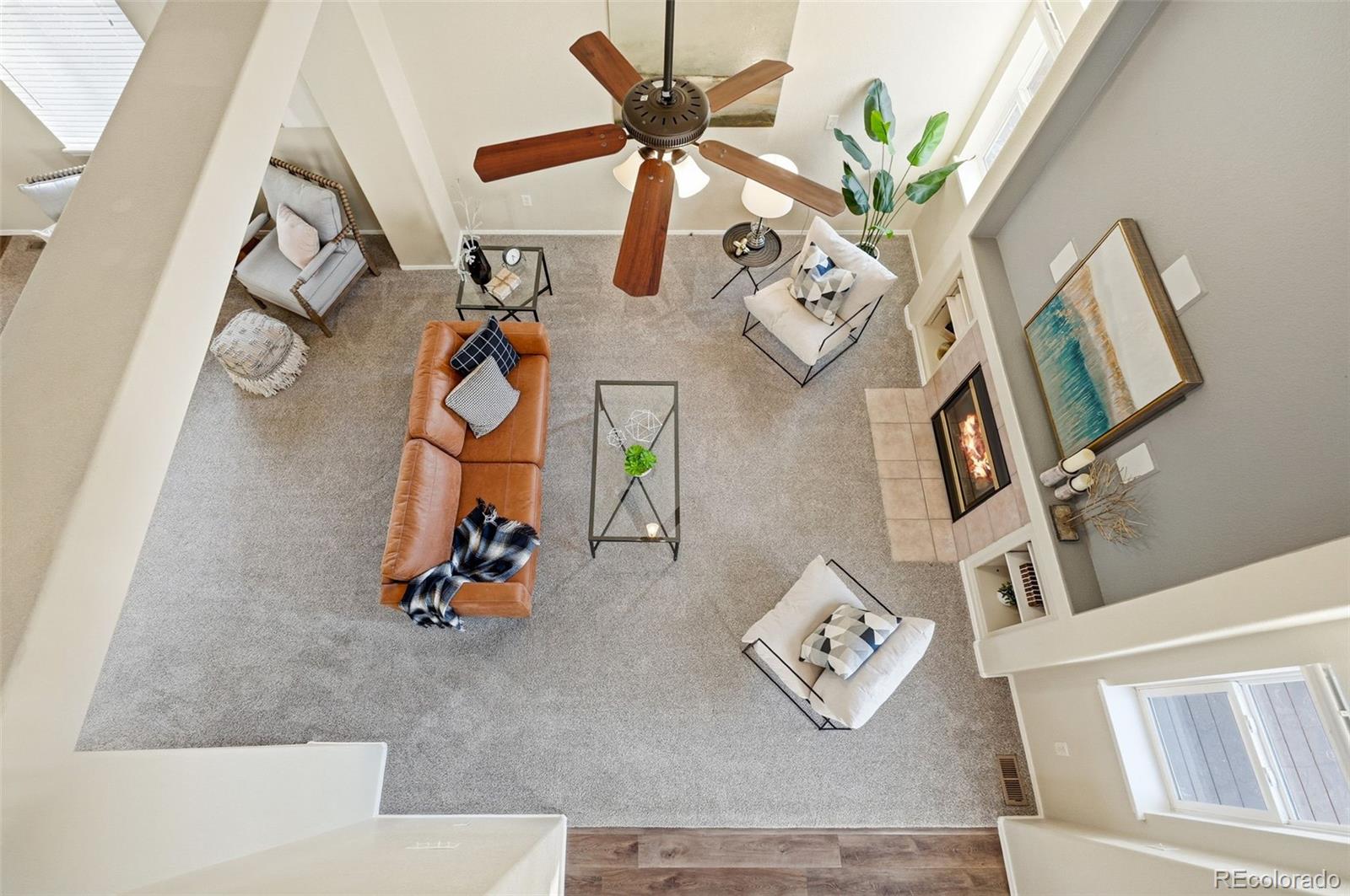 6471 St Vrain Ranch Boulevard Firestone, CO 80504 - Photo 22 of 45 wooden floor with table and chairs