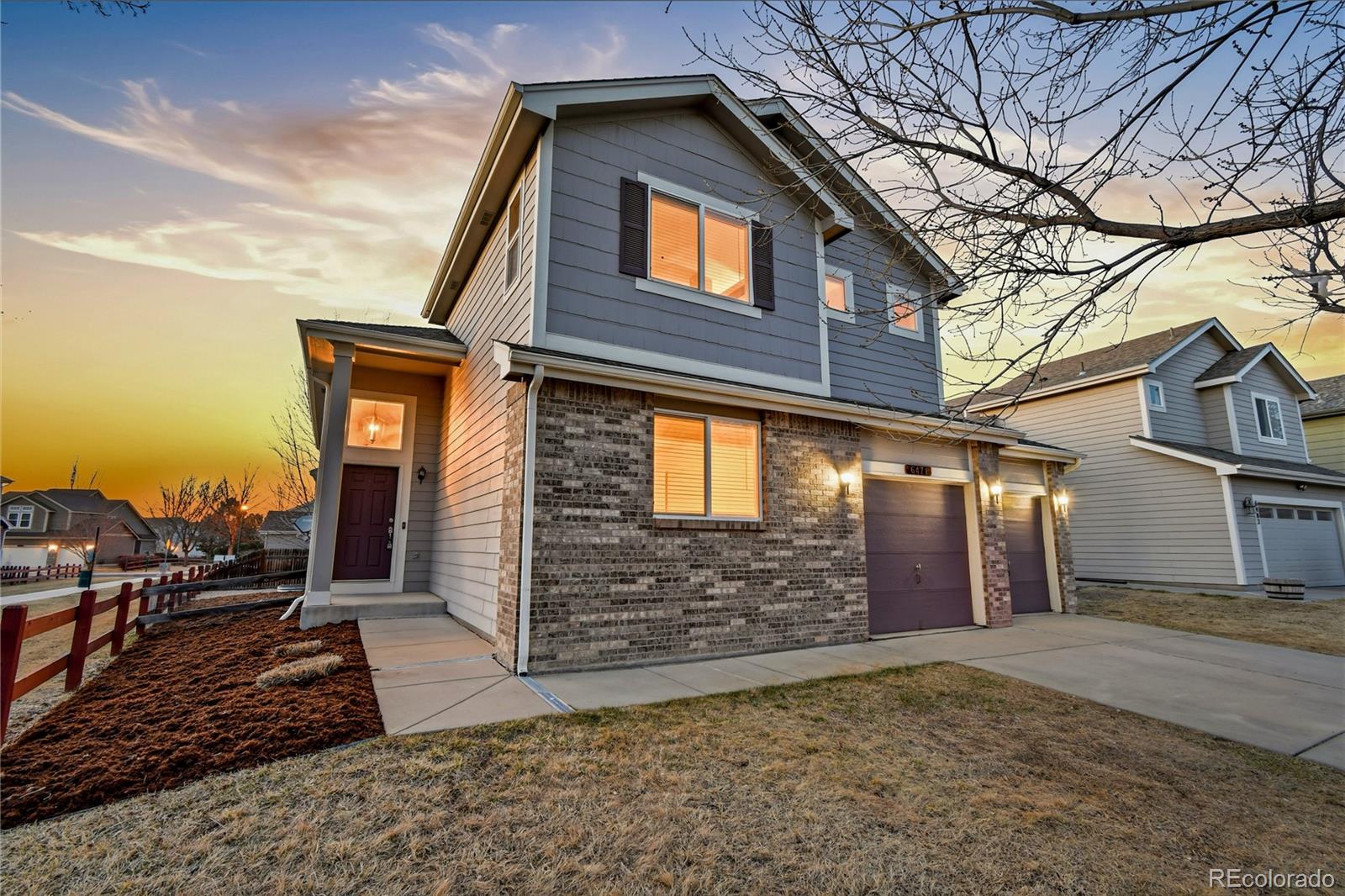 6471 St Vrain Ranch Boulevard Firestone, CO 80504 - Photo 6 of 45 a brick building with a outdoor space