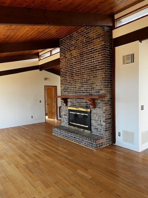 1015 Iron Mountain Road Canton, GA 30115 - Photo 3 of 24 a view of empty room with wooden floor and fireplace