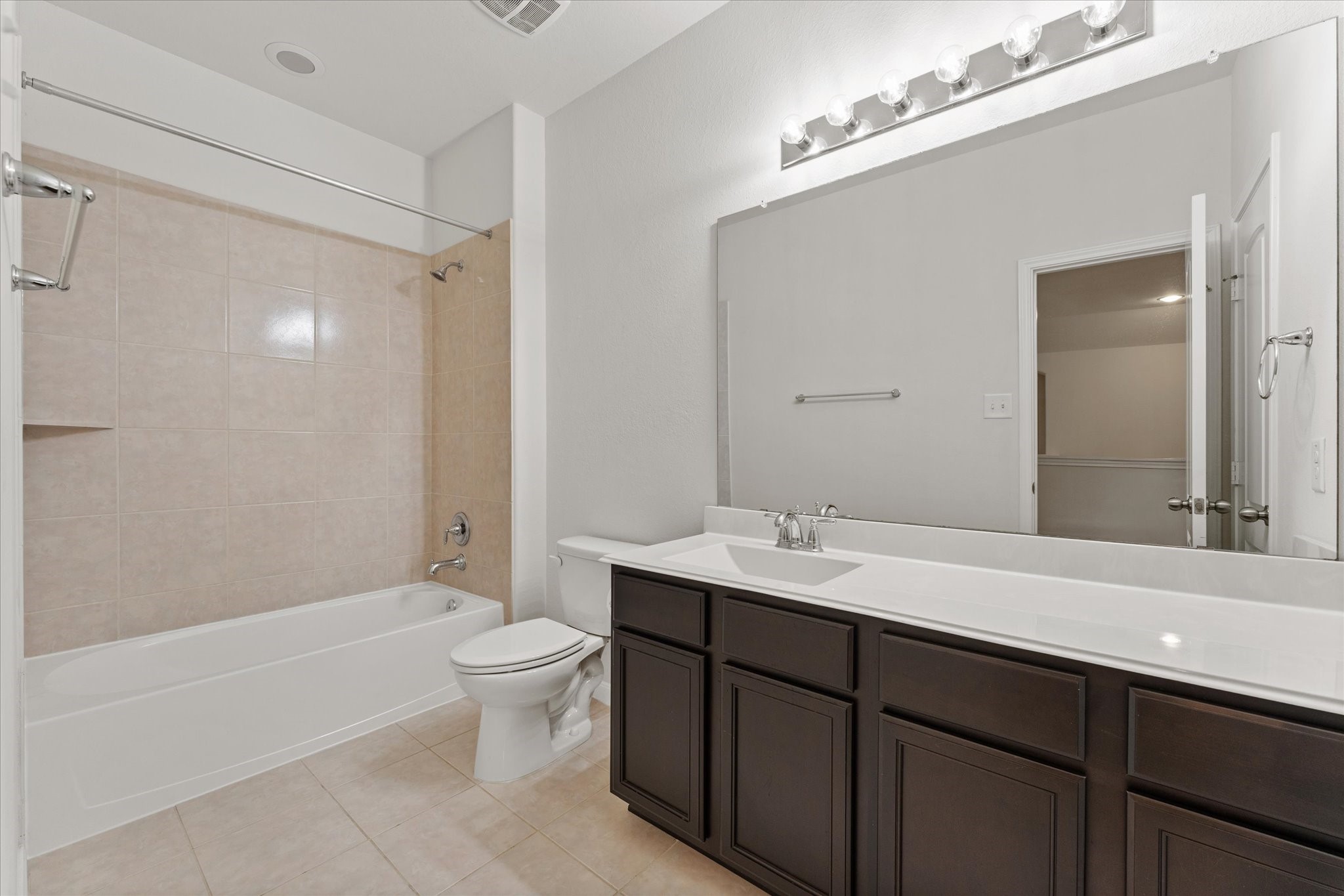 3402 Dryer Park Drive Spring, TX 77373 - Photo 28 of 40 Secondary bathroom with ample lighting, and a modern shower tub combo.