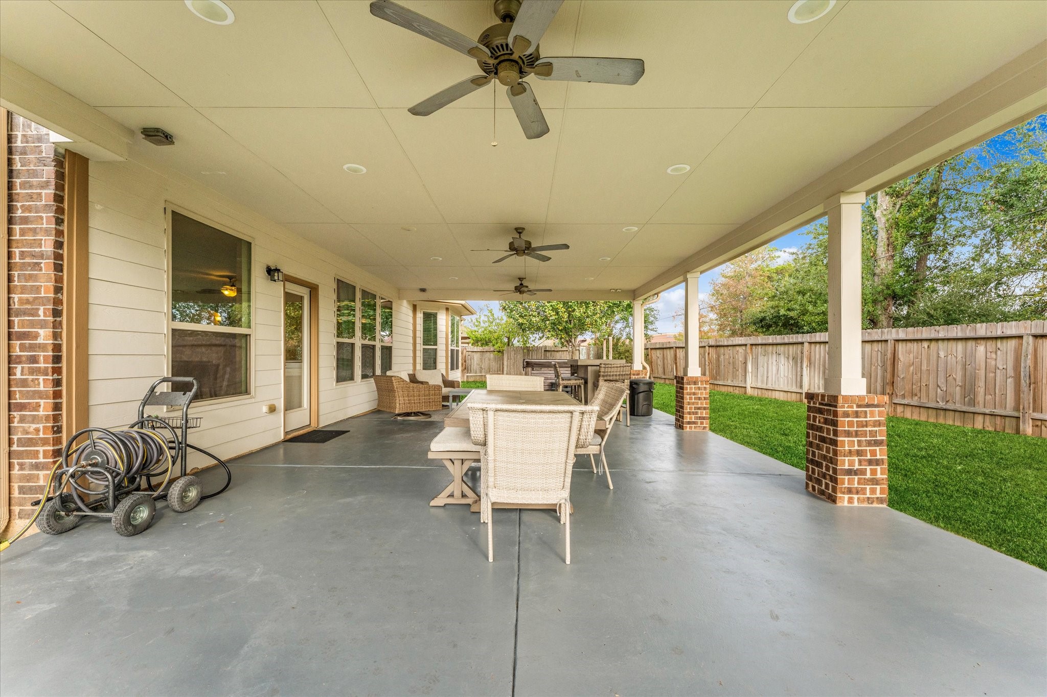 3402 Dryer Park Drive Spring, TX 77373 - Photo 34 of 40 Enjoy the included patio furniture for effortless outdoor living.