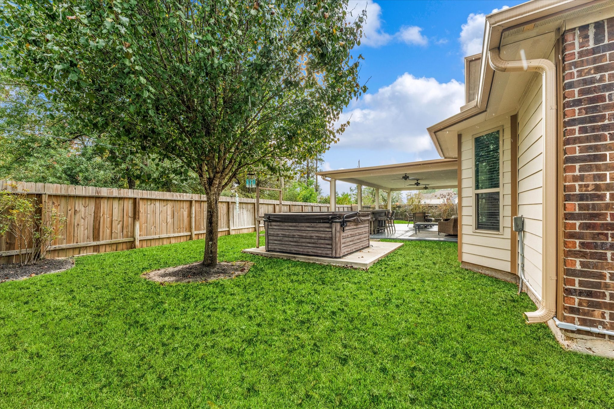 3402 Dryer Park Drive Spring, TX 77373 - Photo 37 of 40 Discover your personal oasis with this inviting outdoor spa, nestled in a serene backyard, perfect for relaxation and unwinding.
