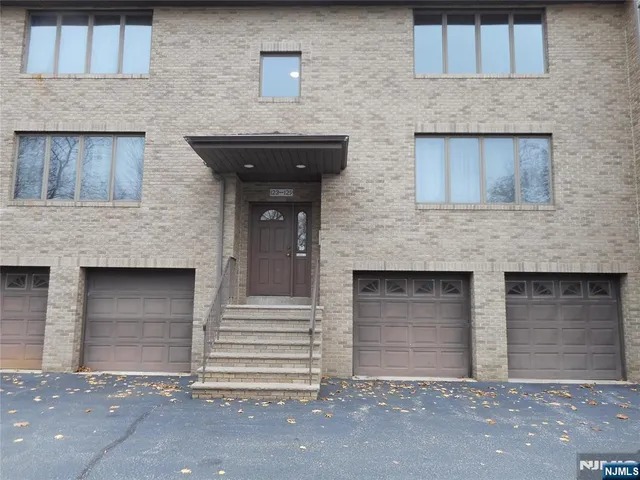 a front view of a stone house
