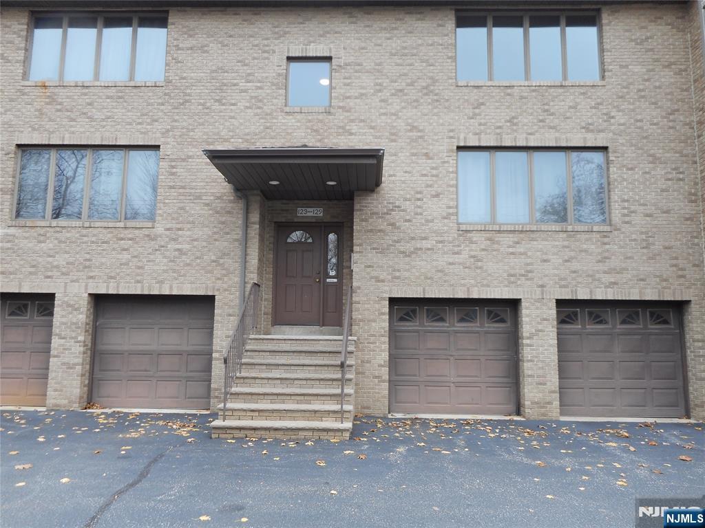 a front view of a stone house