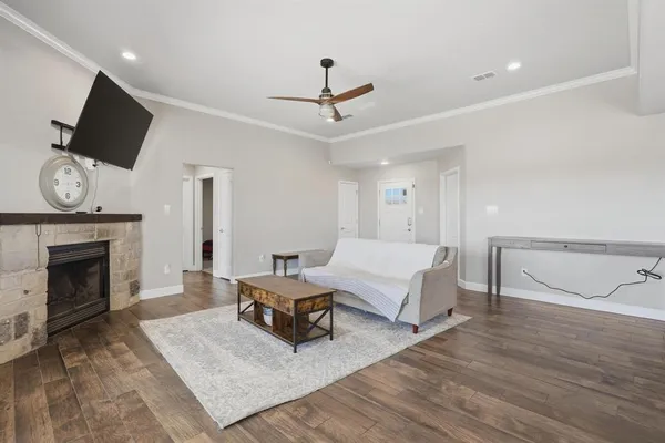 a living room with kitchen view and kitchen view