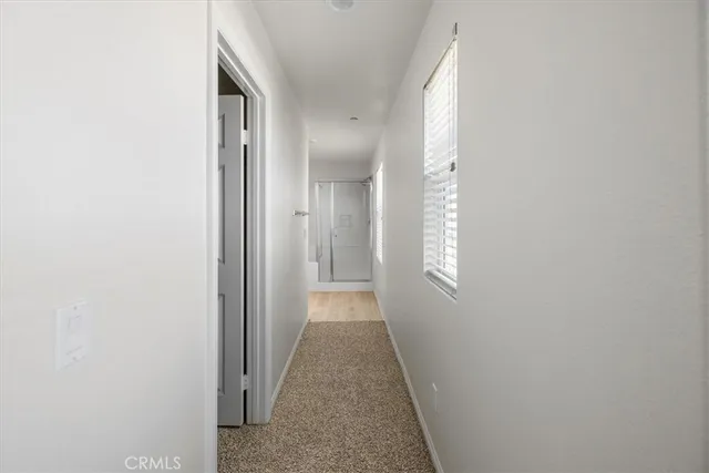 a view of a room with racks on the wall