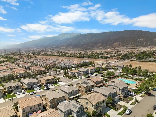 an aerial view of residential building with parking space