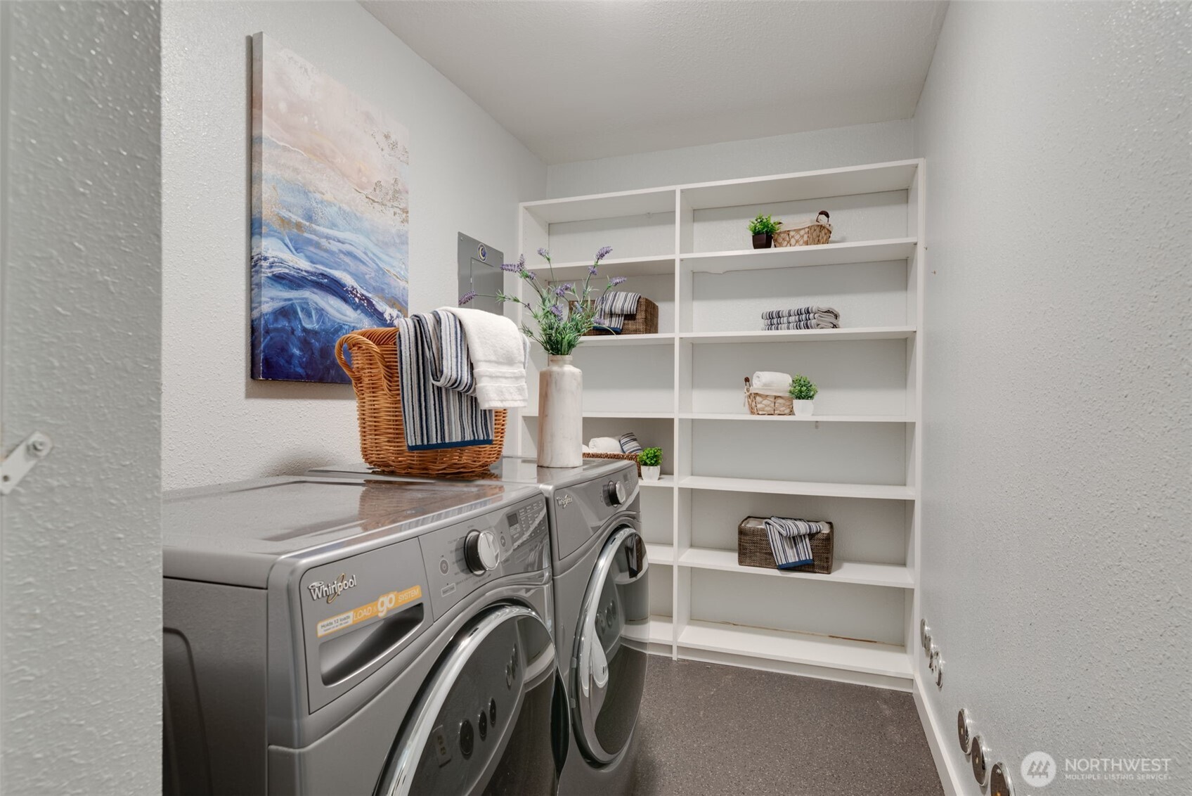 9715 Northeast Juanita Drive, Unit 206B Kirkland, WA 98034 - Photo 25 of 39 a view of storage and utility room with washer and dryer