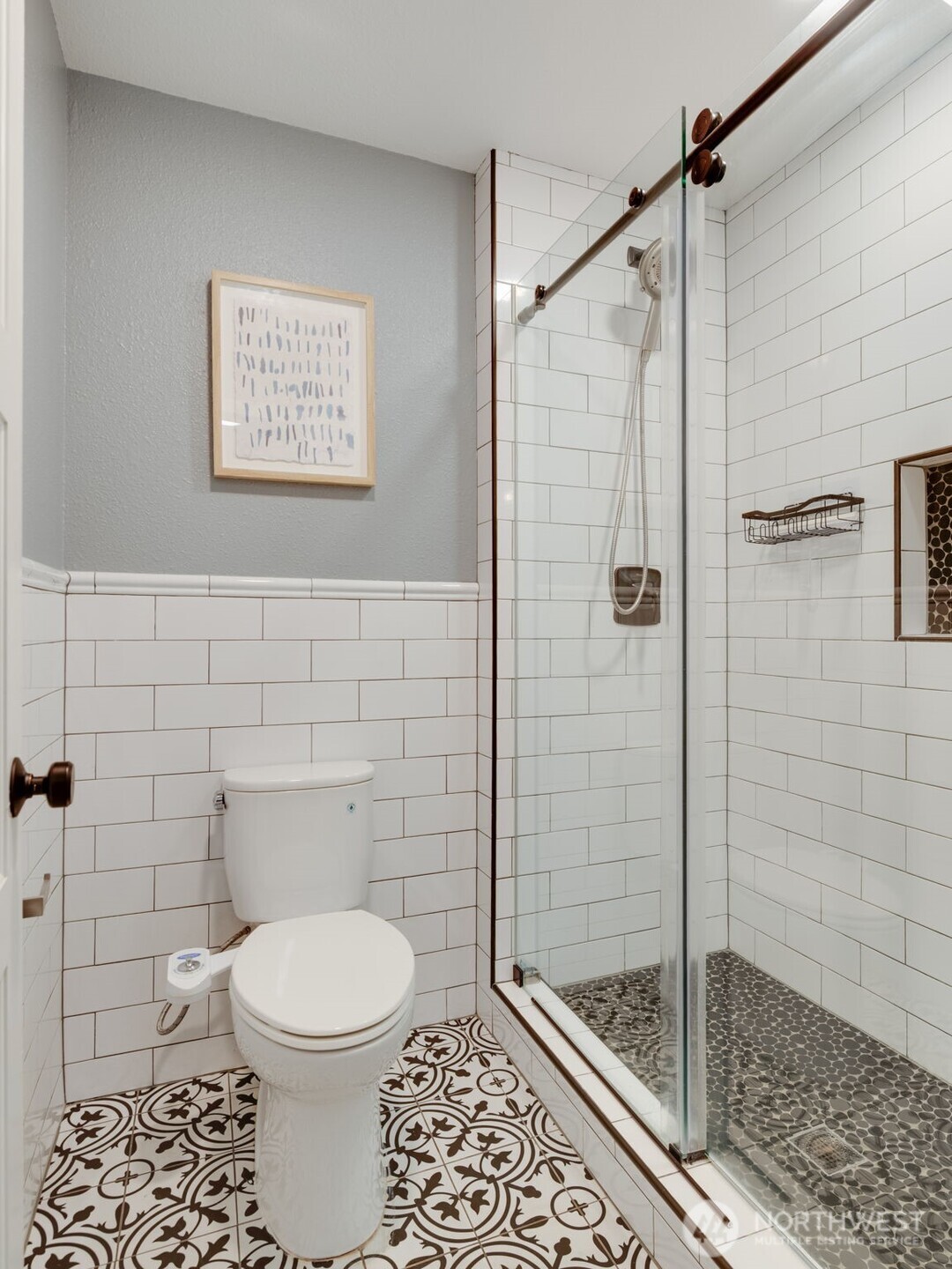 9715 Northeast Juanita Drive, Unit 206B Kirkland, WA 98034 - Photo 31 of 39 a bathroom with a toilet and a shower