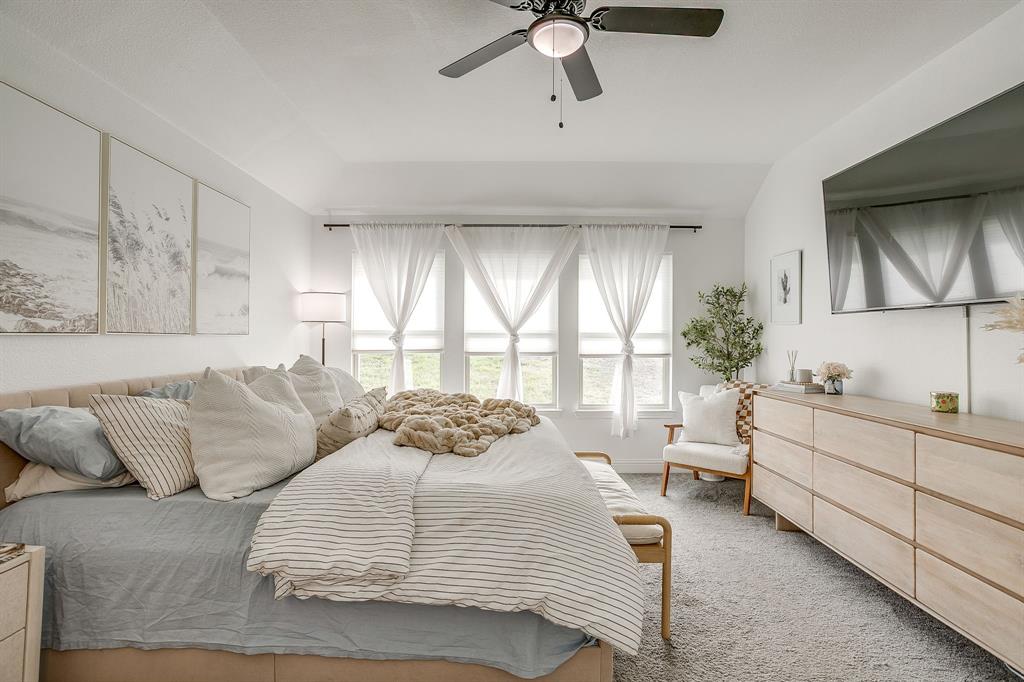 5617 Kilpatrick Avenue Fort Worth, TX 76107 - Photo 26 of 40 a bedroom with furniture and windows