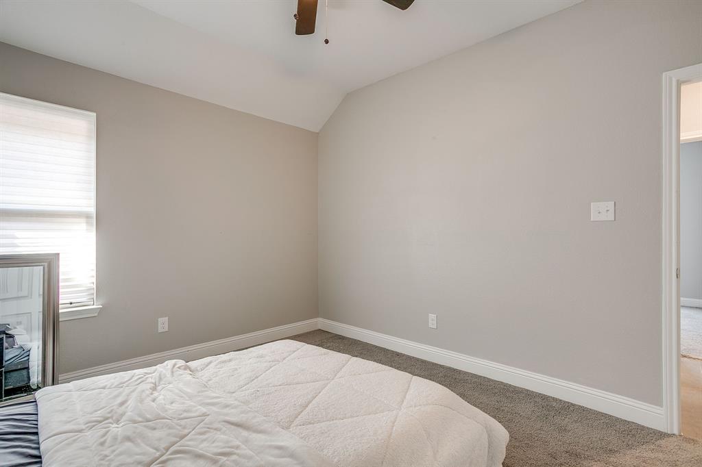 5617 Kilpatrick Avenue Fort Worth, TX 76107 - Photo 32 of 40 a room with a bed and a window