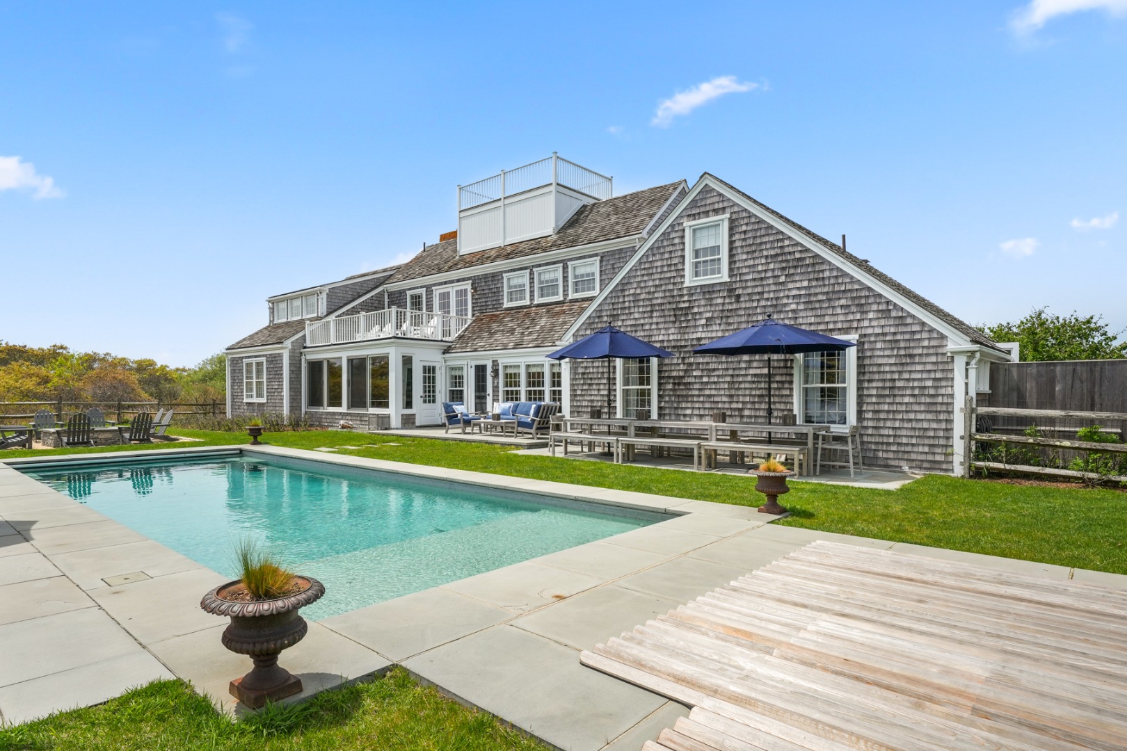 21 Quidnet Road Nantucket, MA 02554 - Photo 58 of 62 a front view of a house with swimming pool
