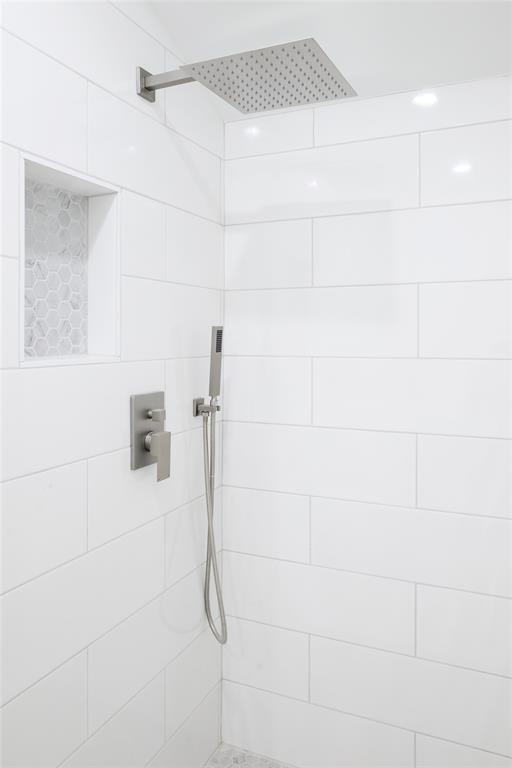 6021 Northwood Road Dallas, TX 75225 - Photo 20 of 40 a bathroom with a shower