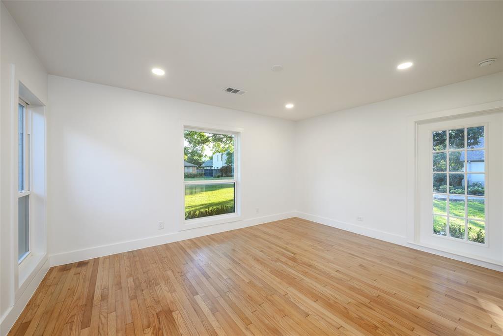 6021 Northwood Road Dallas, TX 75225 - Photo 32 of 40 an empty room with windows