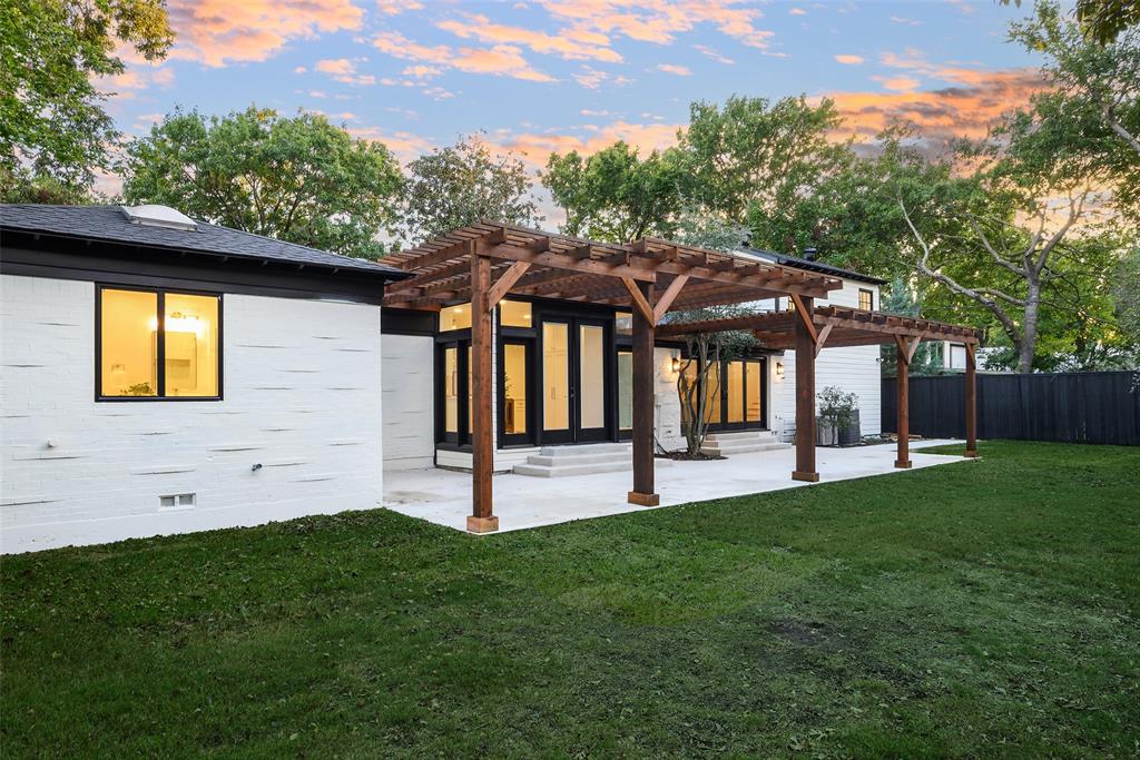 6021 Northwood Road Dallas, TX 75225 - Photo 34 of 40 a front view of a house with garden