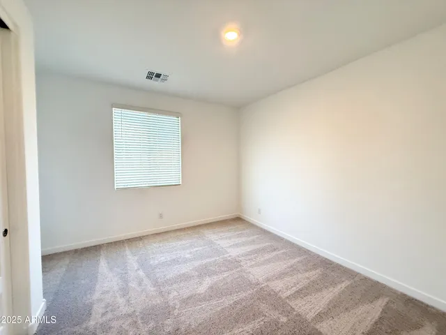 an empty room with an entryway