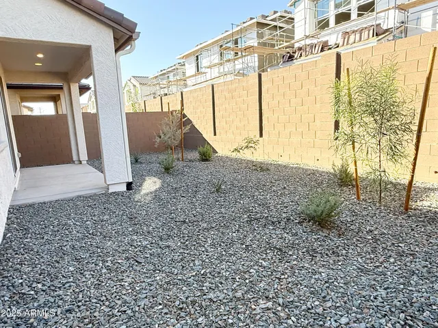 a view of outdoor space with palm trees