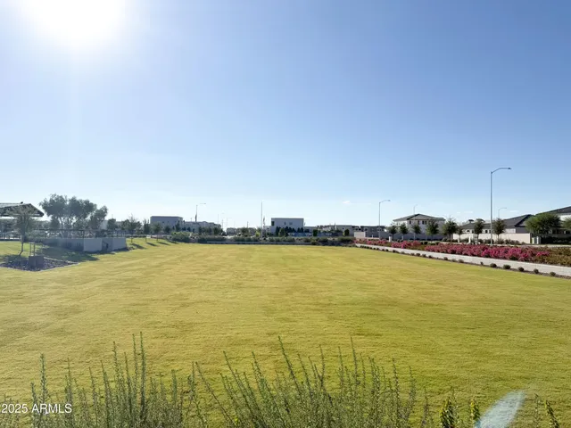 a view of swimming pool with seating area