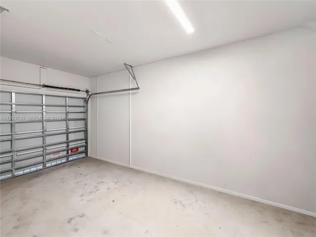 a view of a chairs and table in patio