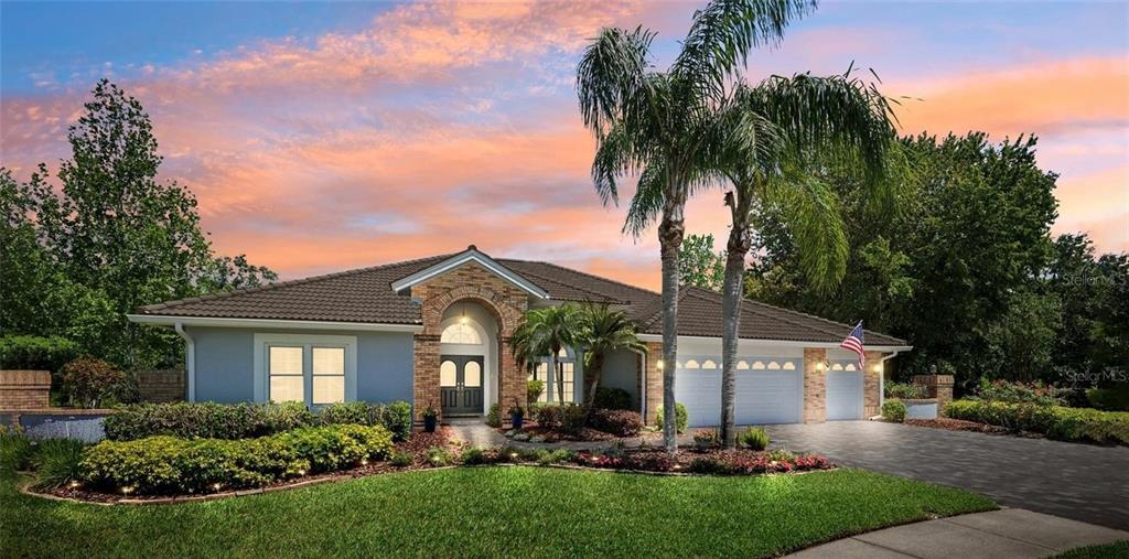 6901 Arabian Road Odessa, FL 33556 - Photo 1 of 1 front view of a house with a yard