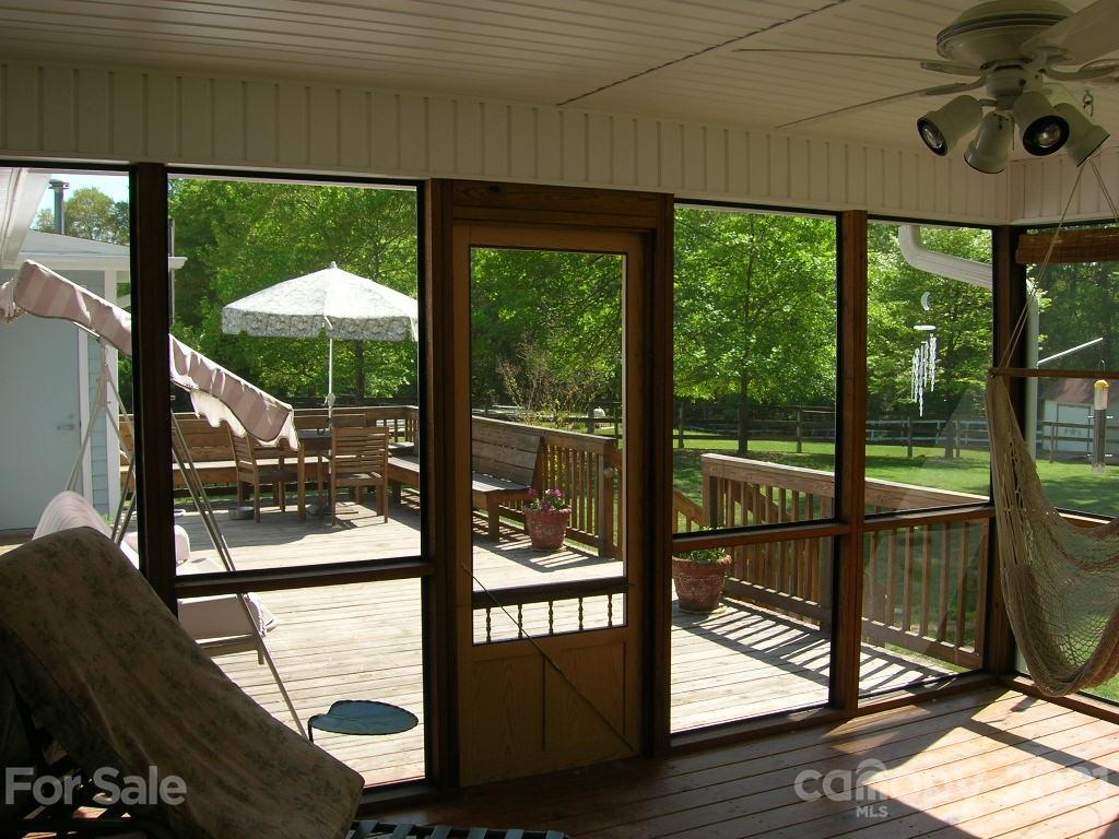 1766 Williams Road Fort Mill, SC 29715 - Photo 11 of 32 a view of a room with a floor to ceiling window next to a yard