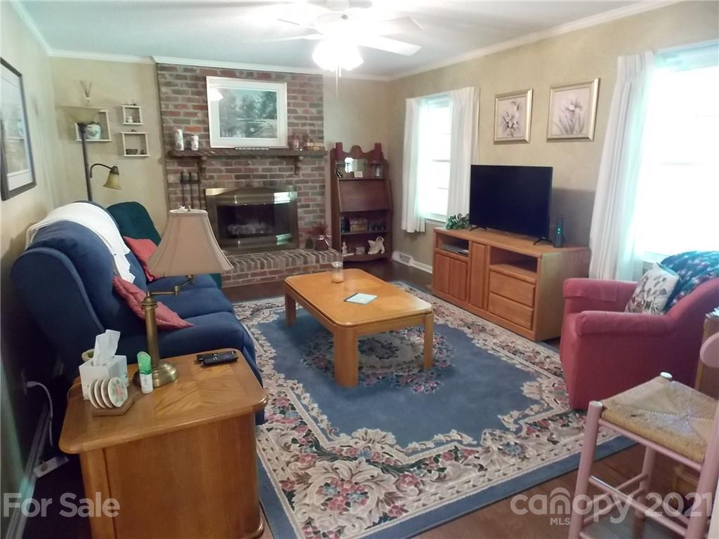 1766 Williams Road Fort Mill, SC 29715 - Photo 13 of 32 a living room with furniture and a flat screen tv