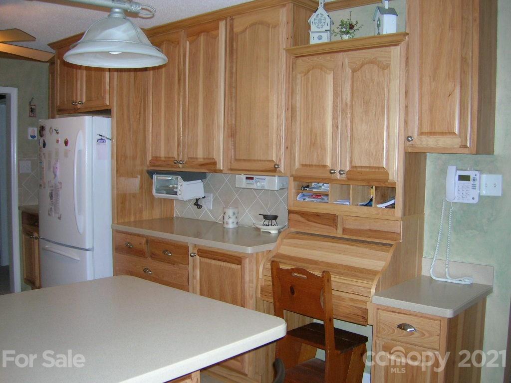1766 Williams Road Fort Mill, SC 29715 - Photo 17 of 32 a kitchen with stainless steel appliances a refrigerator and a stove