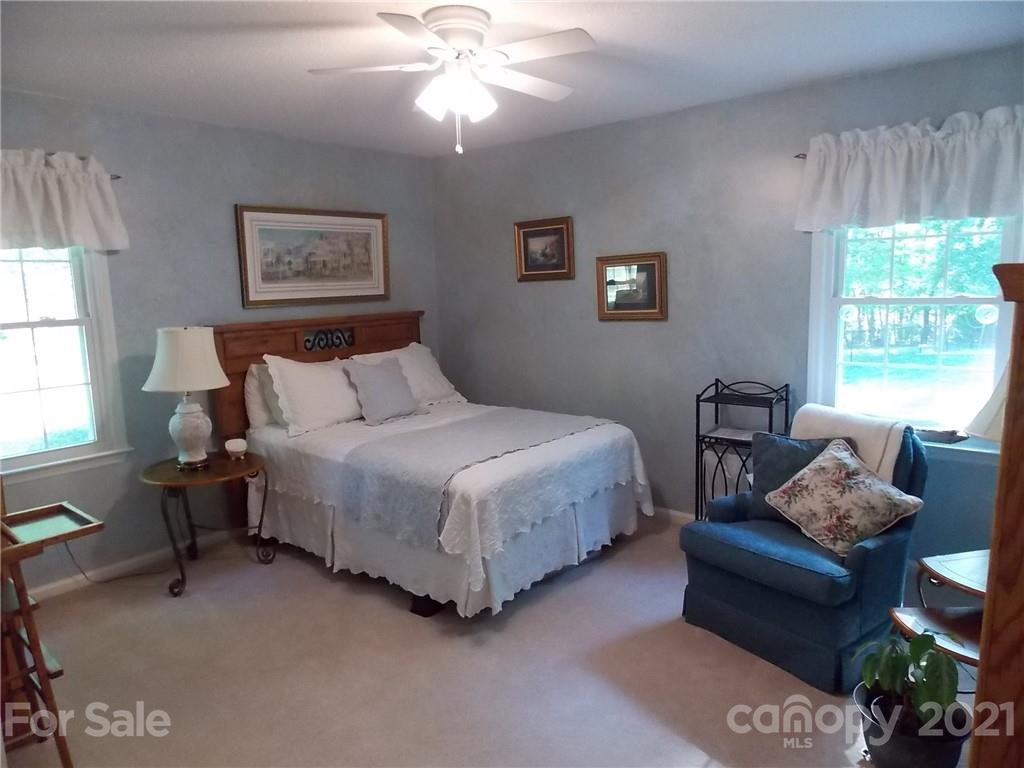 1766 Williams Road Fort Mill, SC 29715 - Photo 24 of 32 a bedroom with furniture and a window