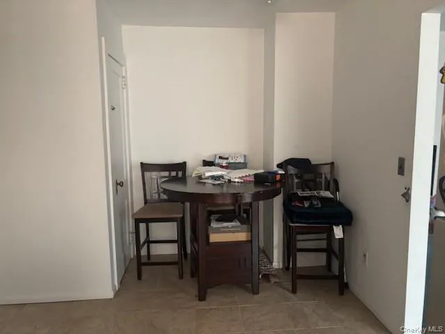 a view of a workspace with furniture