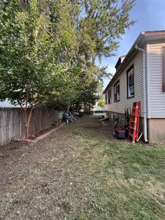 a view of outdoor space with deck and tree