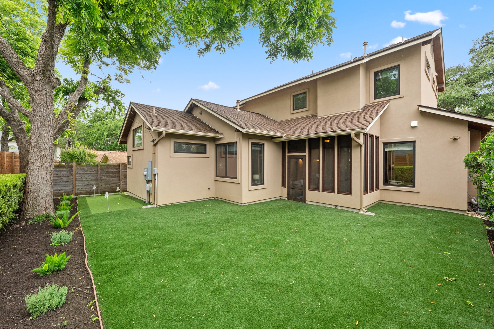 3907 Bailey Lane Austin, TX 78756 - Photo 31 of 40 Additional features of this incredible home include solid wood doors, Carrier A/C units, extensive security fencing, circulating tankless water heater, and an upgraded 50 year roof