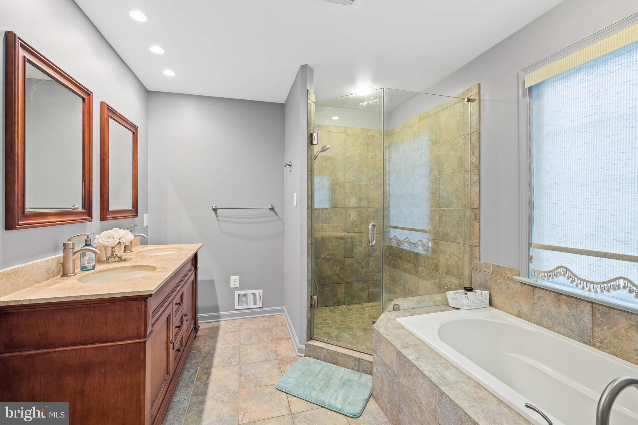 15017 Rolling Ridge Road Haymarket, VA 20169 - Photo 38 of 46 Primary bathroom with spacious walk in shower
