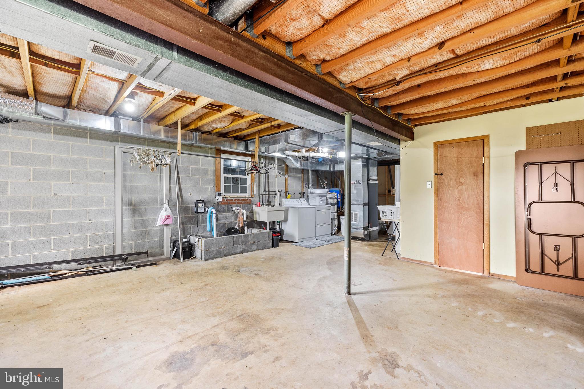 15017 Rolling Ridge Road Haymarket, VA 20169 - Photo 46 of 46 Extra storage in unfinished side of basement
